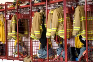 Fireman coats and boots wait for the next call