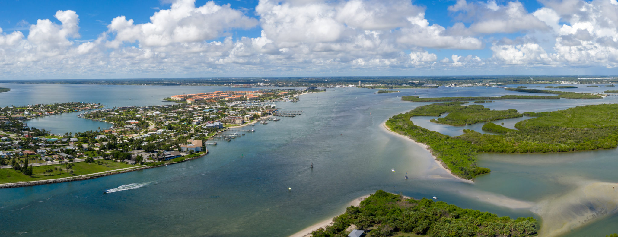 Fort Pierce has an inlet to the Atlantic Ocean that allows boats to come and go from the ocean.